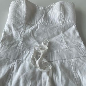 White jumpsuit in size 00 from Bebe. Great condition, only worn once.